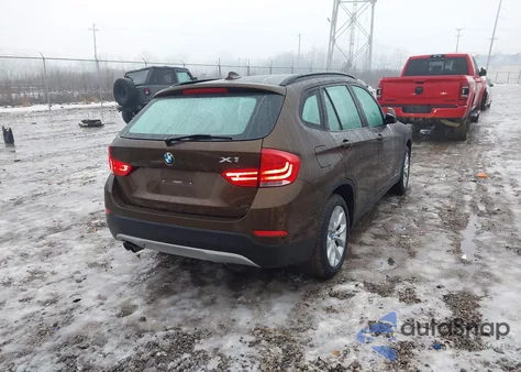 2014 BMW X1 xDrive28I z USA, uszkodzony, nr VIN WBAVL1C52EVY11753